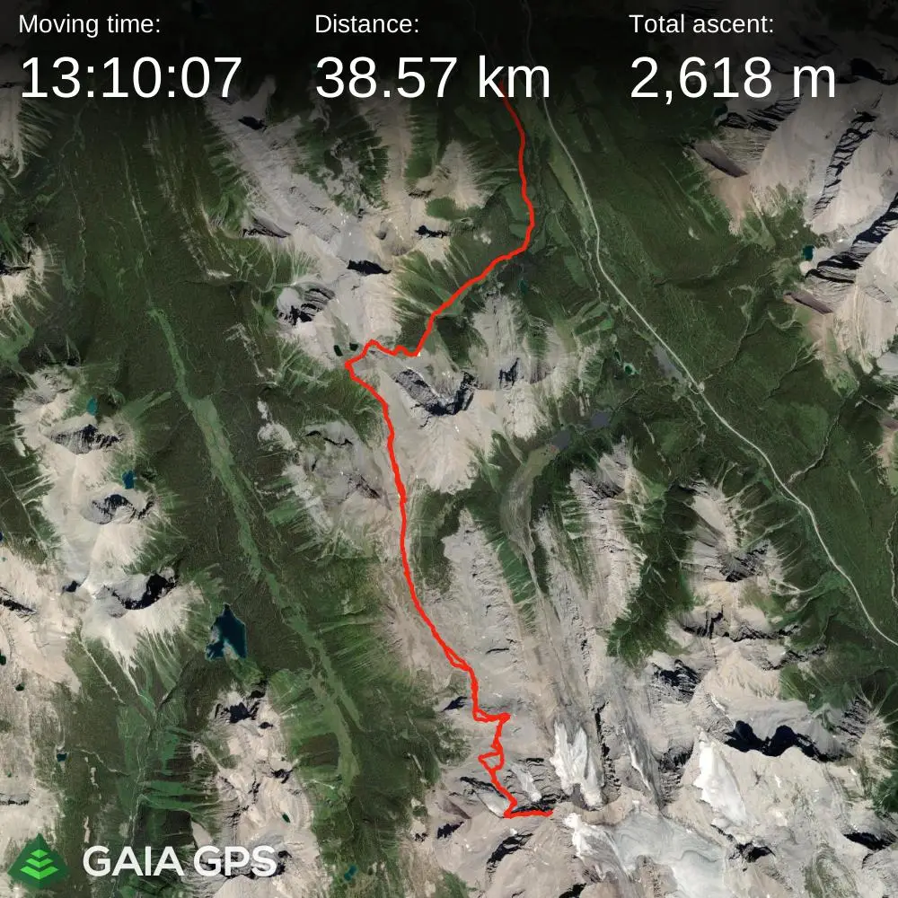 Satellite route map showing a 38.57 km round trip and 2,618 meters of elevation gain for the Mount Sir Douglas ascent via Smuts Pass, bypassing the closed Burstall Pass trailhead.
