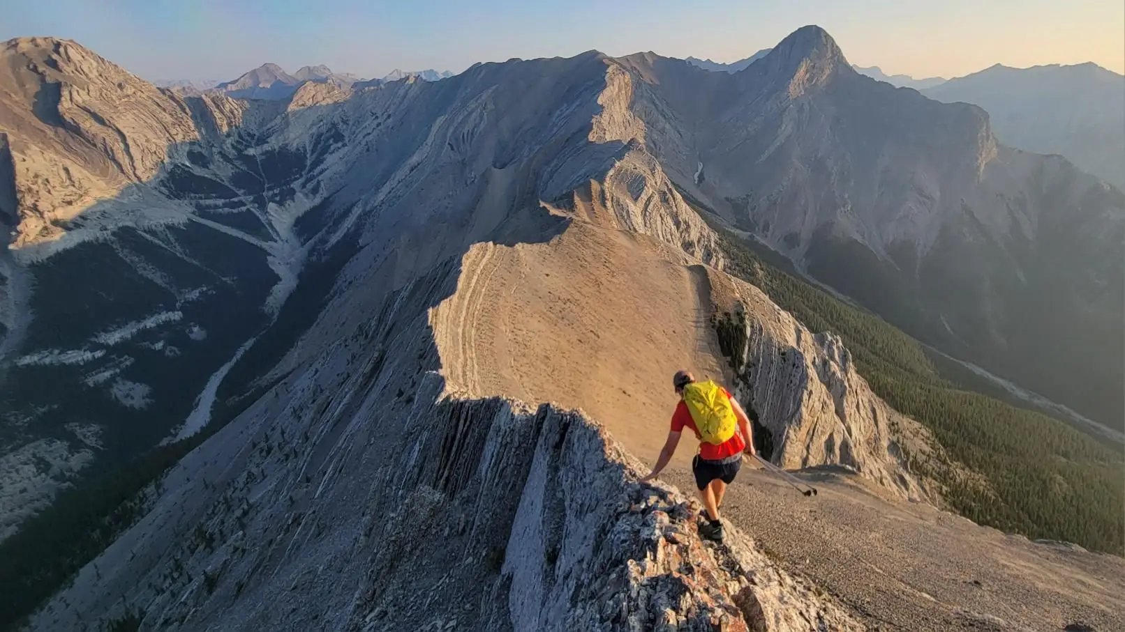 A climber following the ridge from Gap Peak to Mount Fable near the beginning of the Anklebreaker Traverse route.