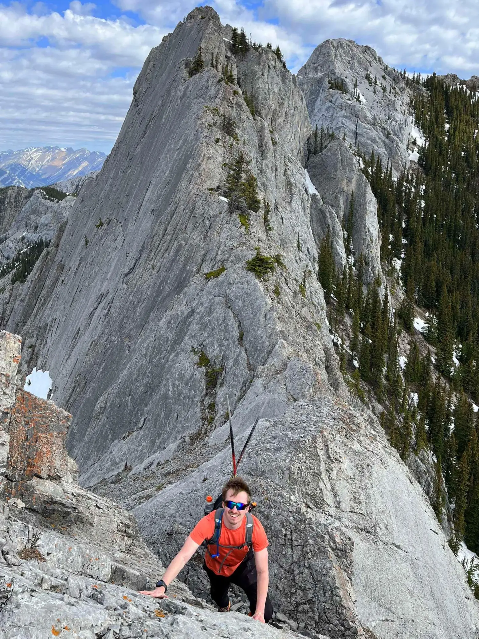 A climber on the exposed section of ridge between the Twin Towers and Mary Barclay Mountain.