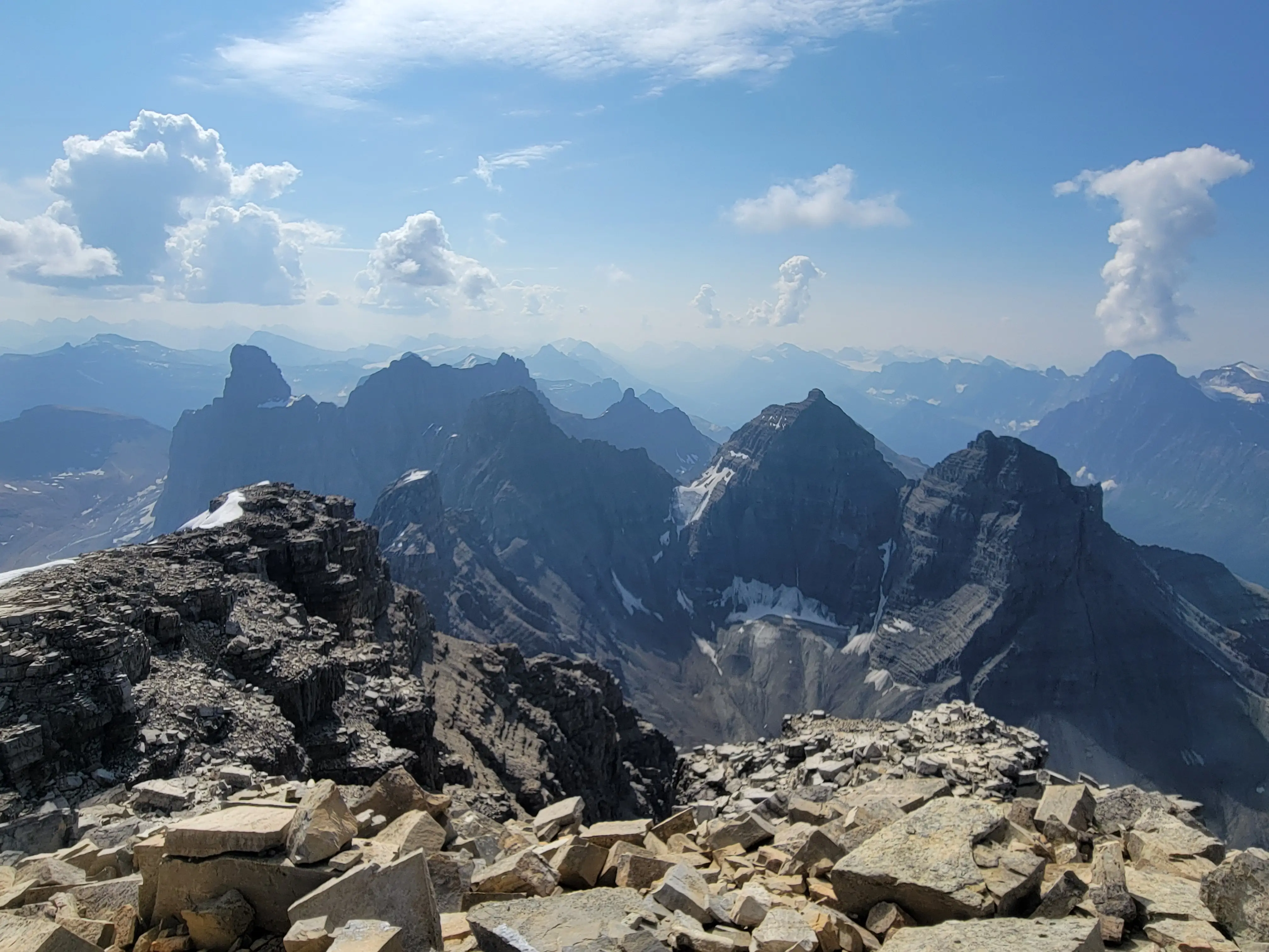 A view from the summit of Mount Murchison on a blue sky day looking south towards the Murchison Towers.