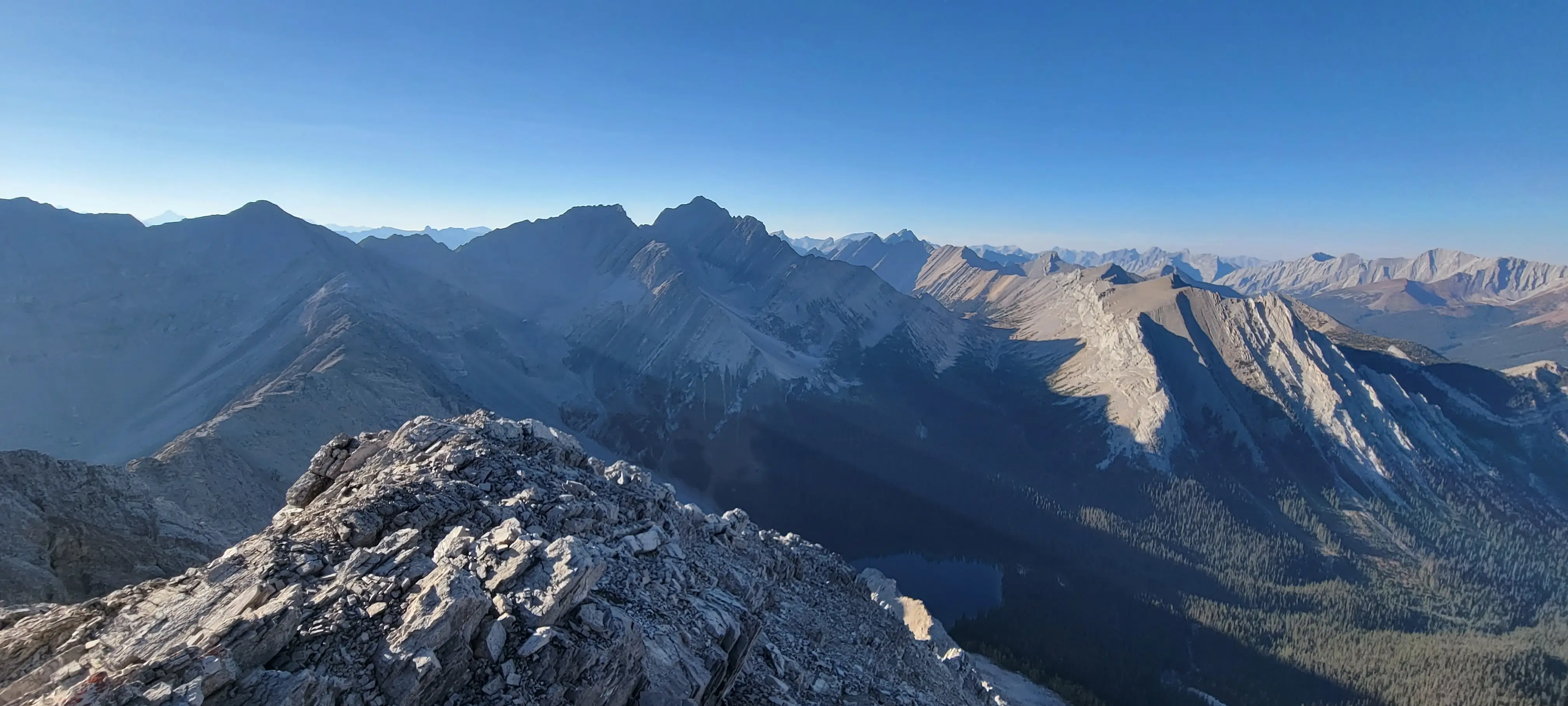 An evening photo of Mystic Peak with the southeast face visible.