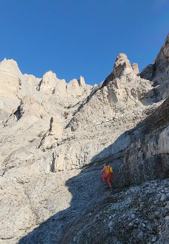 A climber ascending the main peak of Mount Rundle during the Rundle Traverse.